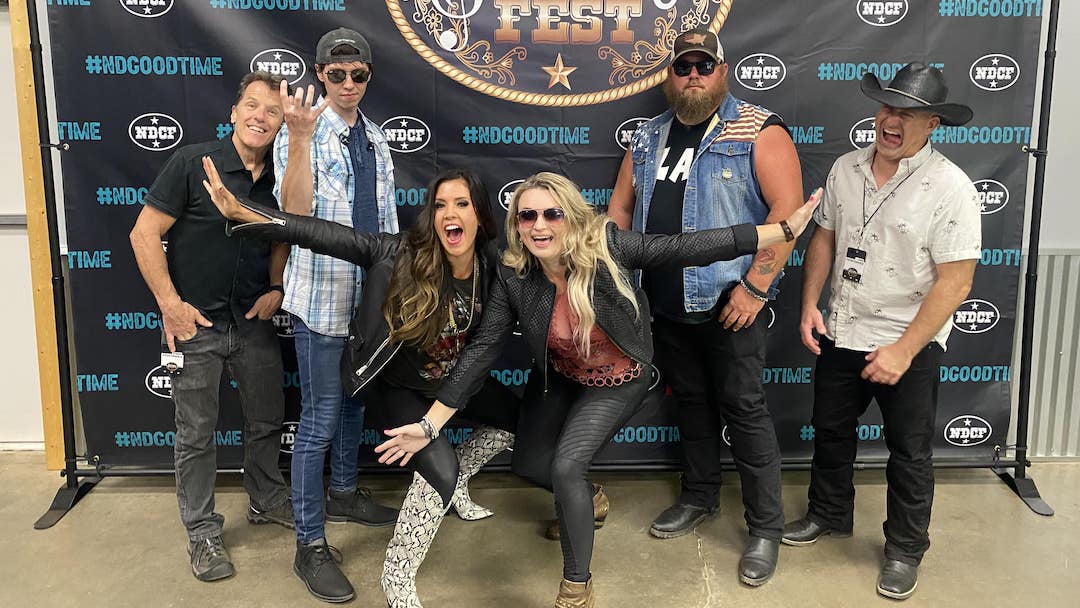 Country band Diamonds & Whiskey pose for a photo at the North Dakota Country Fest